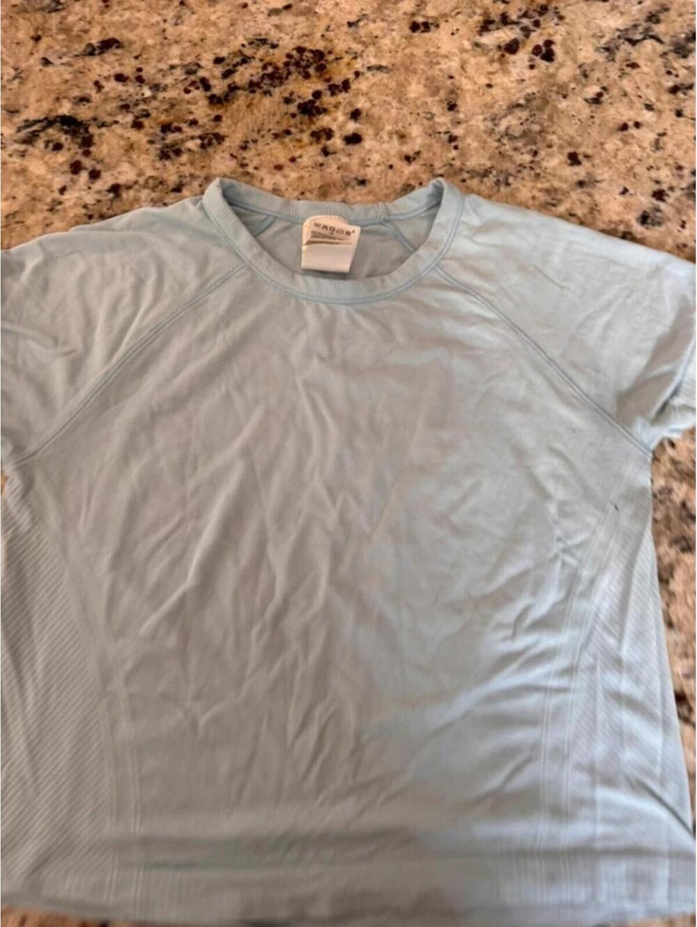 Athleta Girl size medium short sleeve shirt